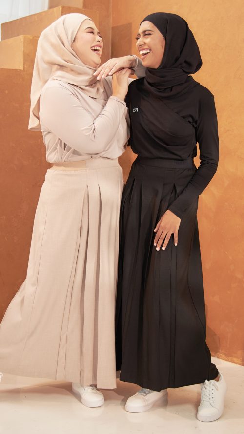 A-Line Pleated Skirt - (Sand) Couple Full Body 1 A-Line Pleated Skirt - (Sand) Couple Full Body 1